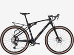 Black bicycle with brown tires on a white background