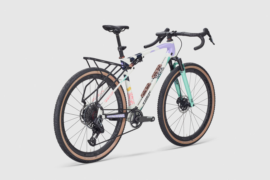 Bicycle with a colorful frame on a light gray background