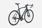Green bicycle on a white background