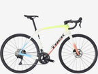 Colorful bicycle with 'Trek' branding on a white background