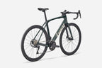 Green bicycle on a white background