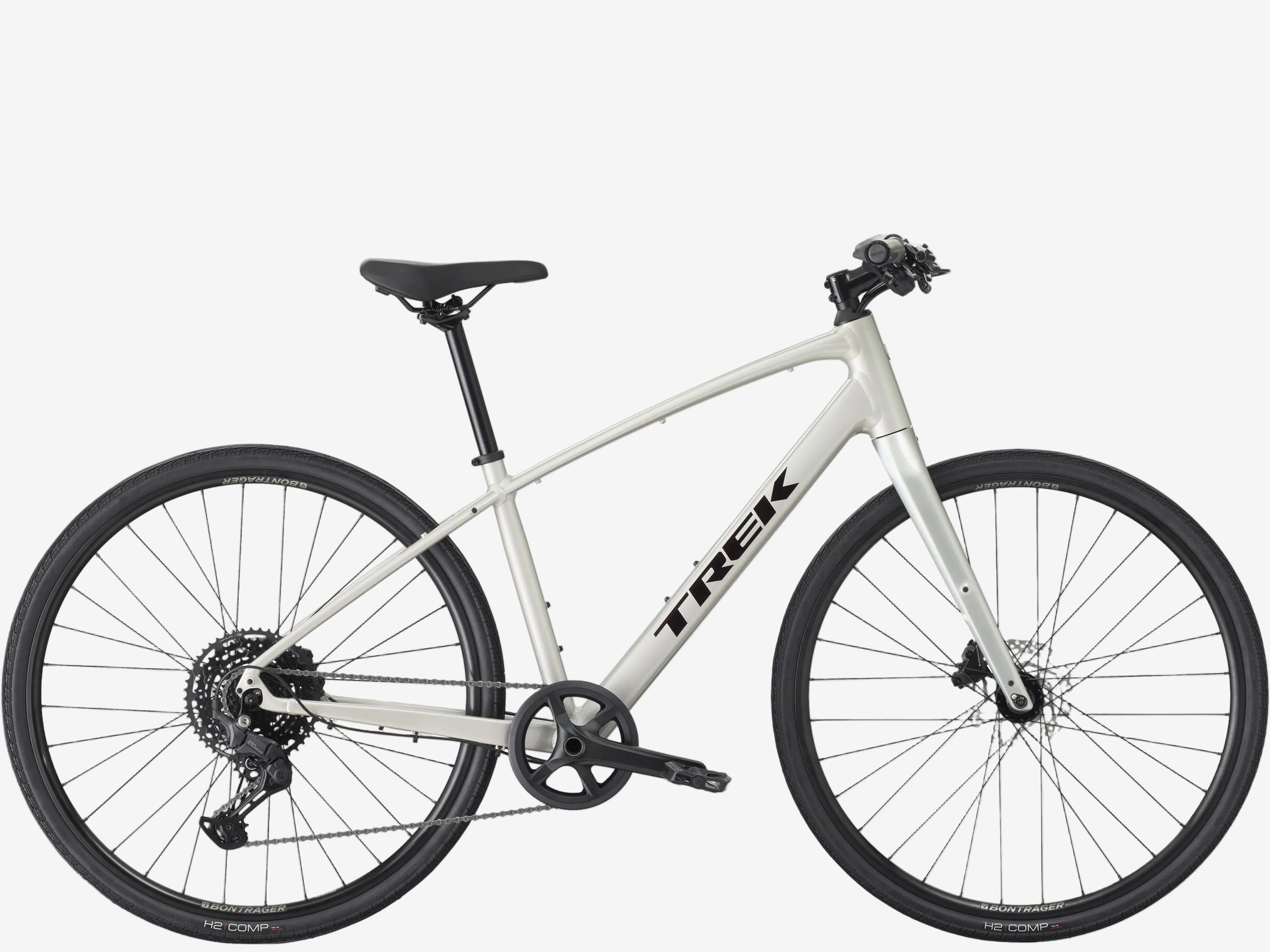 White bicycle with 'Trek' branding on a white background