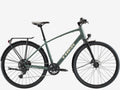 Green Trek bicycle on a white background
