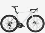 White bicycle with black tires on a white background