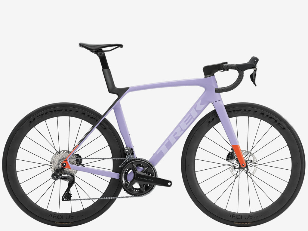 Purple bicycle with black components on a white background