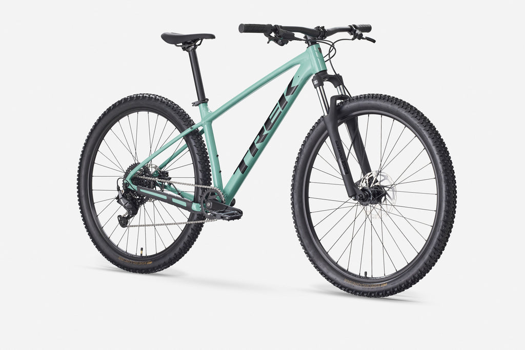 Green mountain bike on a white background