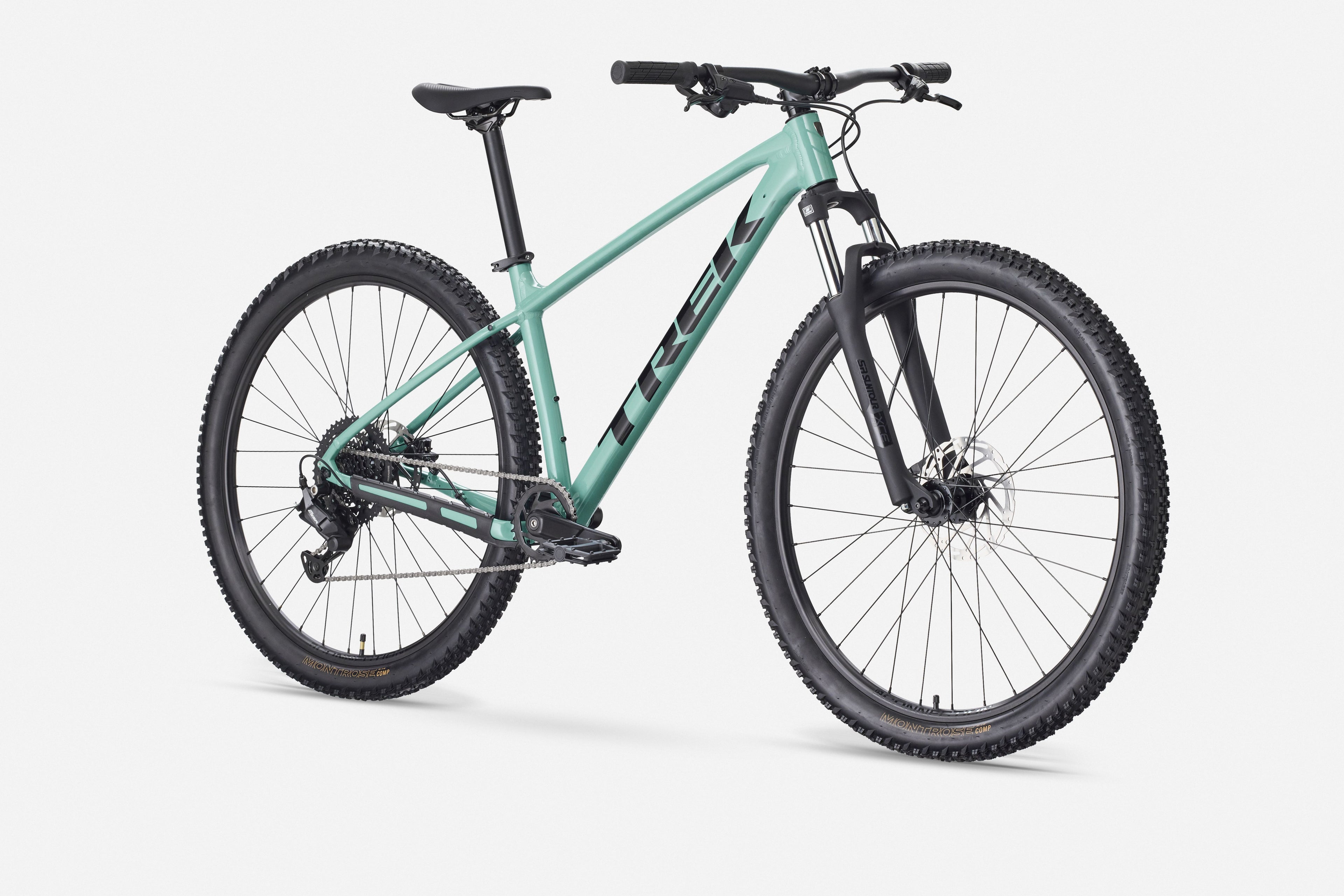 Green mountain bike on a white background