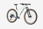 Light blue mountain bike on a white background