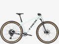 White mountain bike with black components on a white background