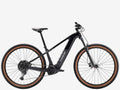 Black electric bike with brown tires on a white background