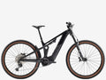 Black mountain bike with brown tires on a white background
