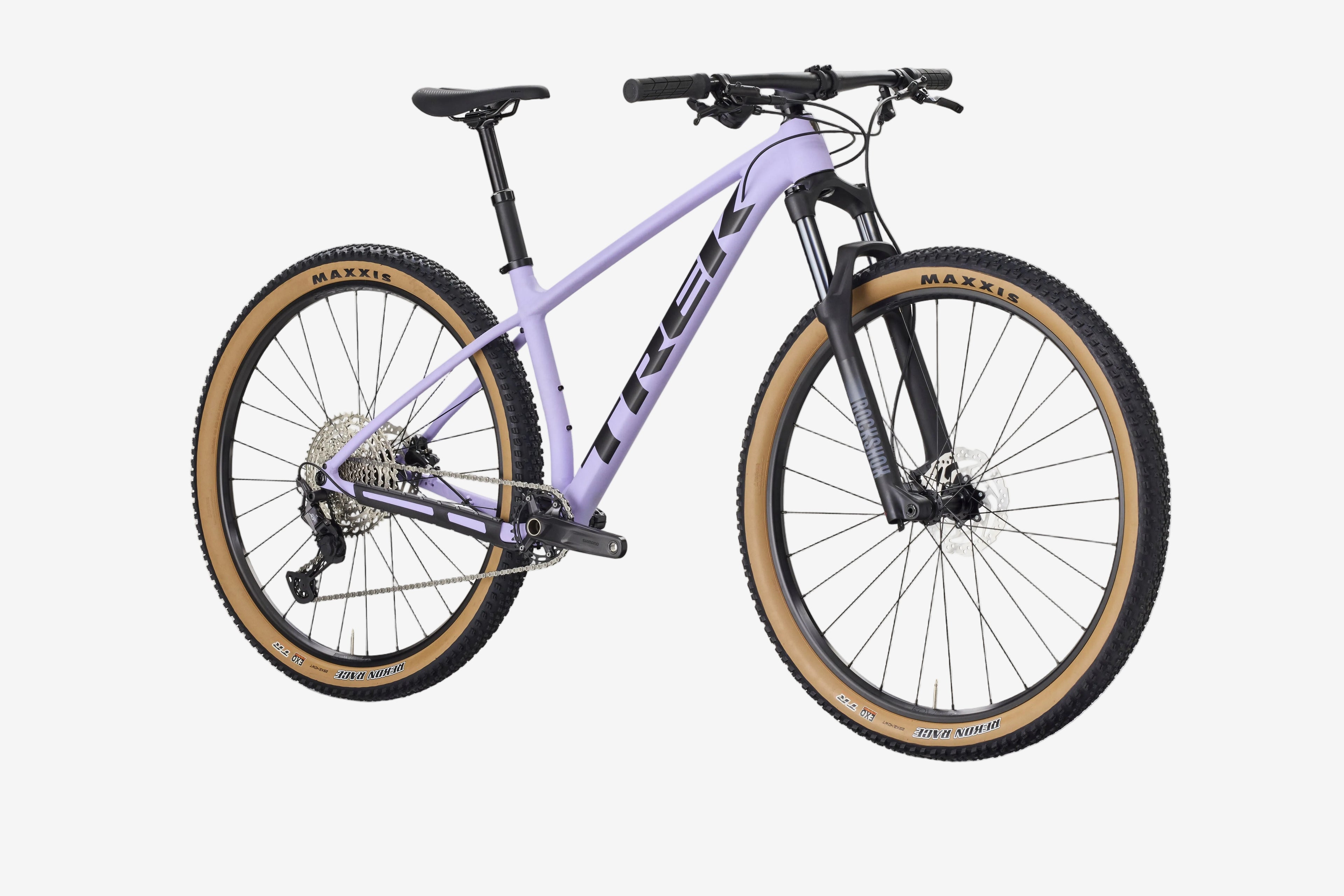 Purple mountain bike with black components on a white background