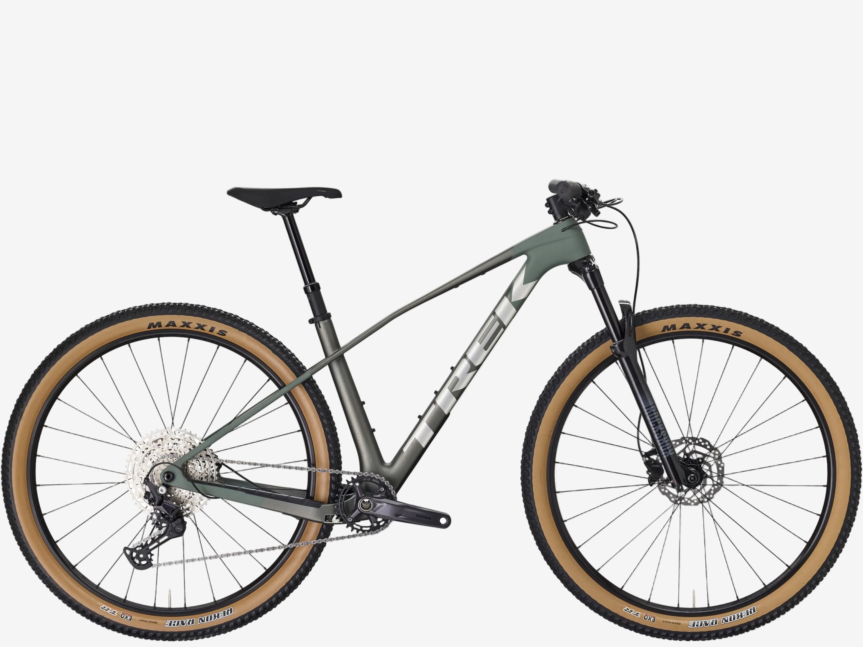 Mountain bike with a green frame and tan tires on a white background