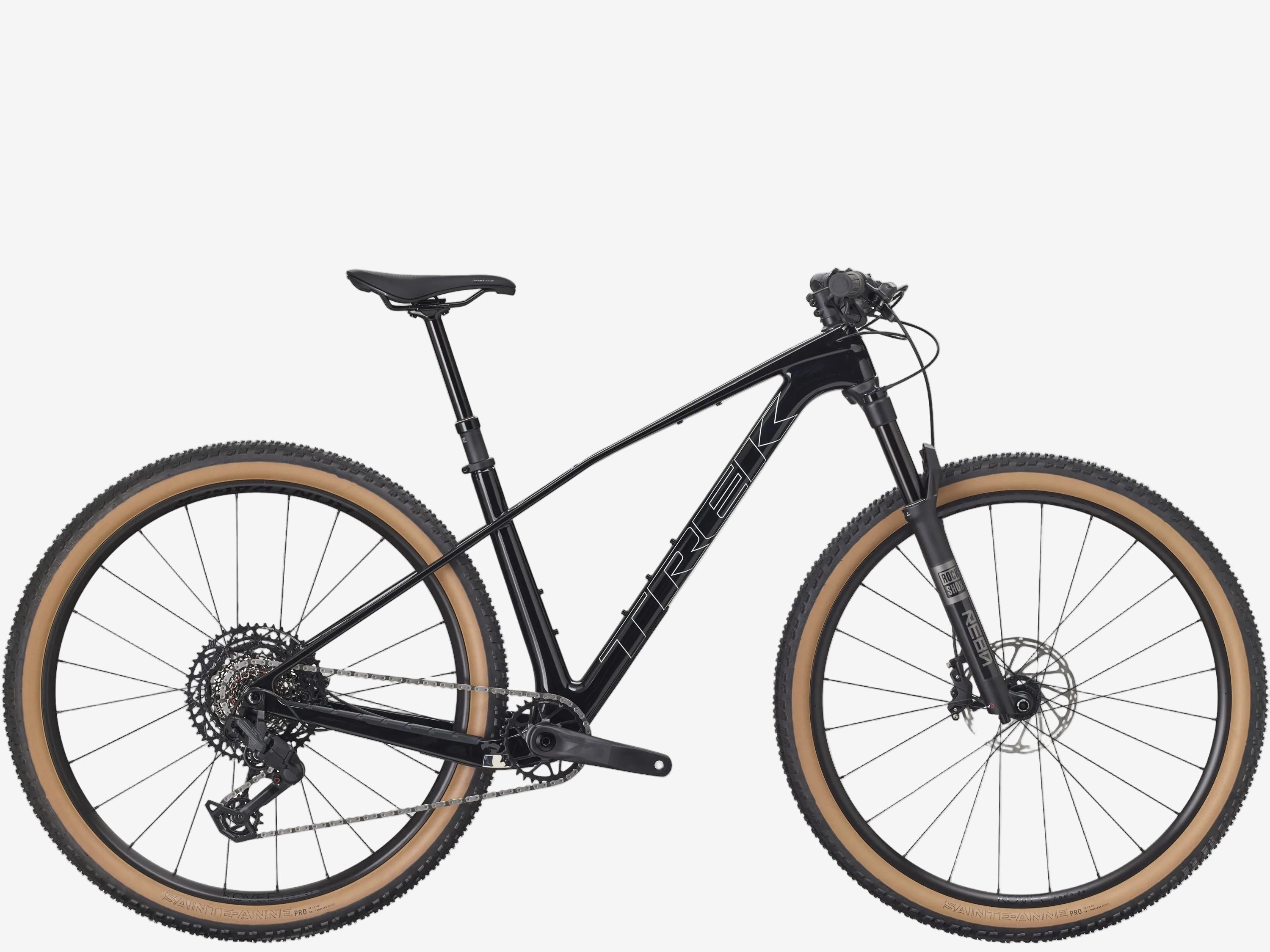 Black mountain bike with brown tires on a white background