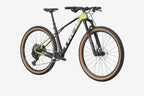 Mountain bike with black frame and green accents on a white background