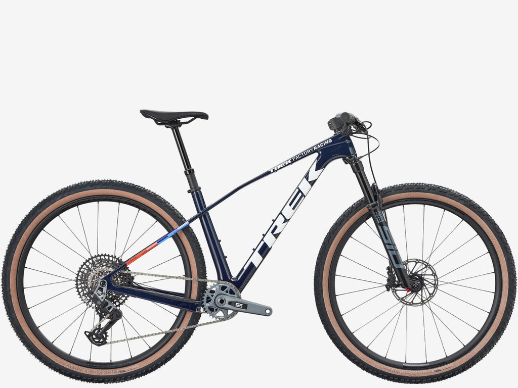 Mountain bike with brown tires on a white background