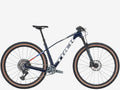 Mountain bike with brown tires on a white background