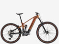 Brown and black bicycle on a white background