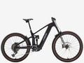 Black electric bike with brown tires on a white background