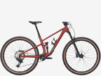 Red mountain bike on a white background