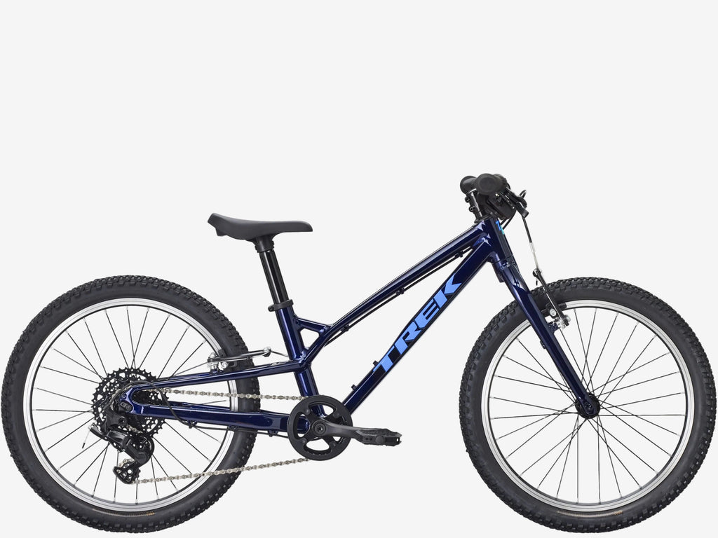 Blue children's bicycle with 'Trek' branding on a white background